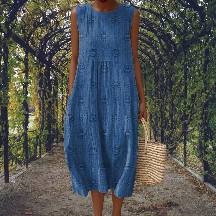 Natasha – Elegant sleeveless dress with pockets