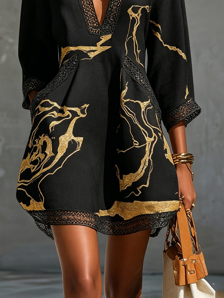 Xanthe | Black Crocheted Lace Mini Dress with Gold Accents and V-Neck